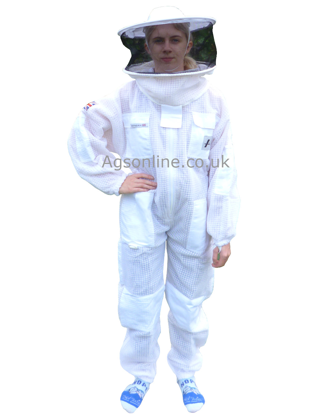 Child wearing white children's 3 layer bee suit with round hat veil