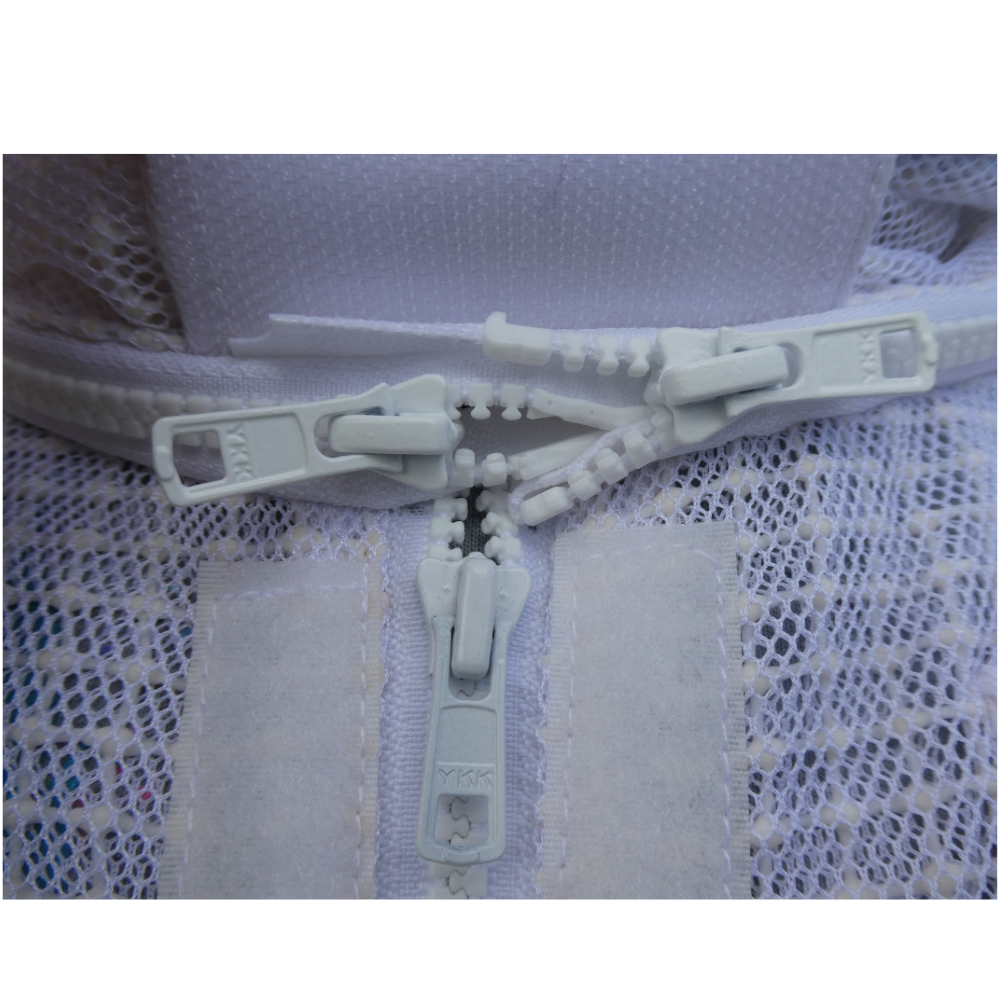 Close-up of double zip on white children's 3 layer ventilated bee suit